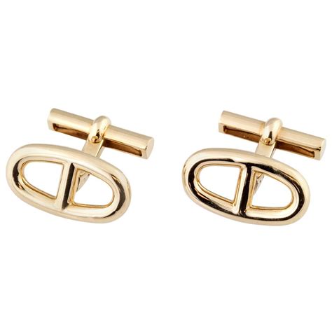 hermes cufflinks gold and enamel.